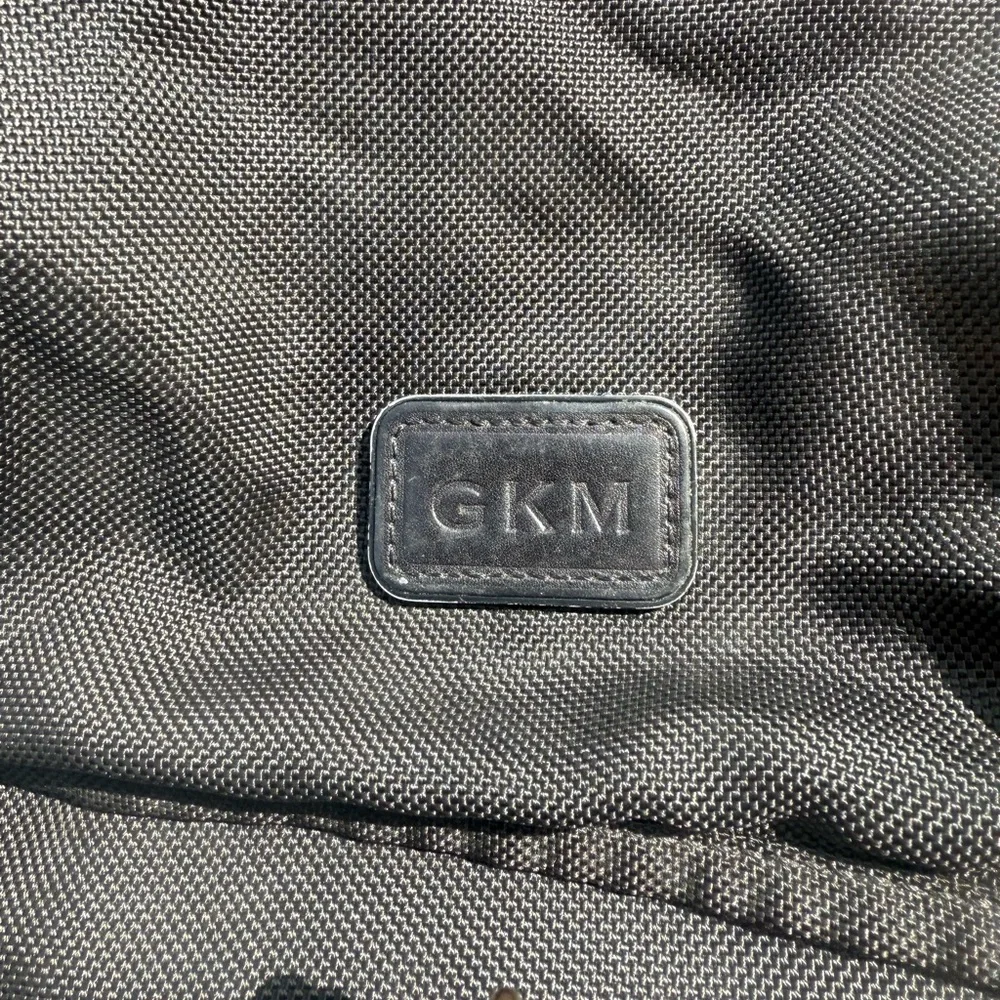 TUMI MESSENGER BAG.